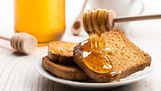 honey dripping on bread