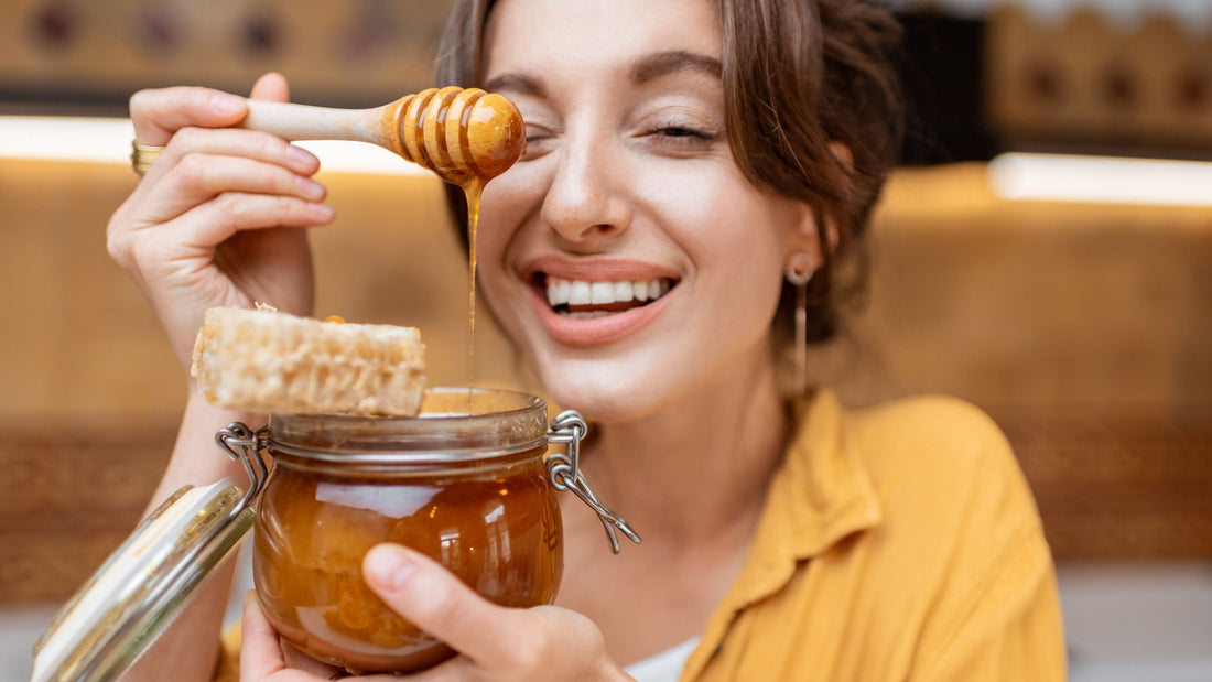 woman smiling over honey